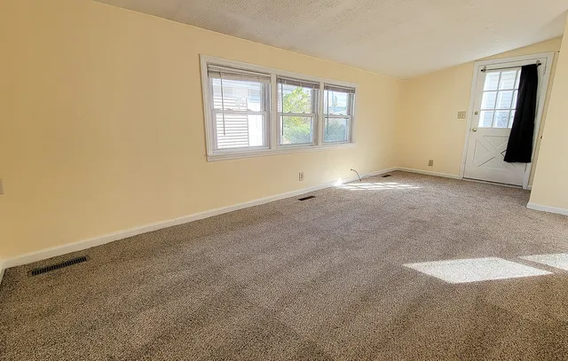 an empty room with windows