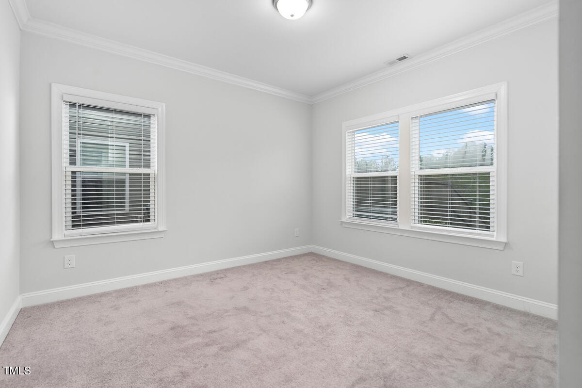 2612 Nordmann Fir Road Raleigh, NC 27616 - Photo 16 of 39 Downstairs guest bedroom.