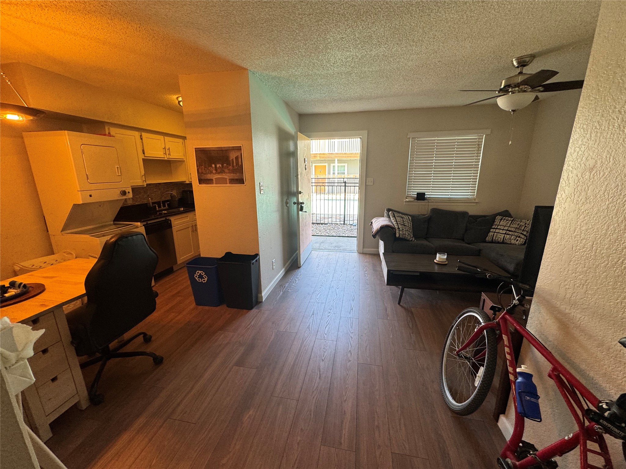 2401 Manor Road, Unit 118 Austin, TX 78722 - Photo 10 of 10 a living room with furniture