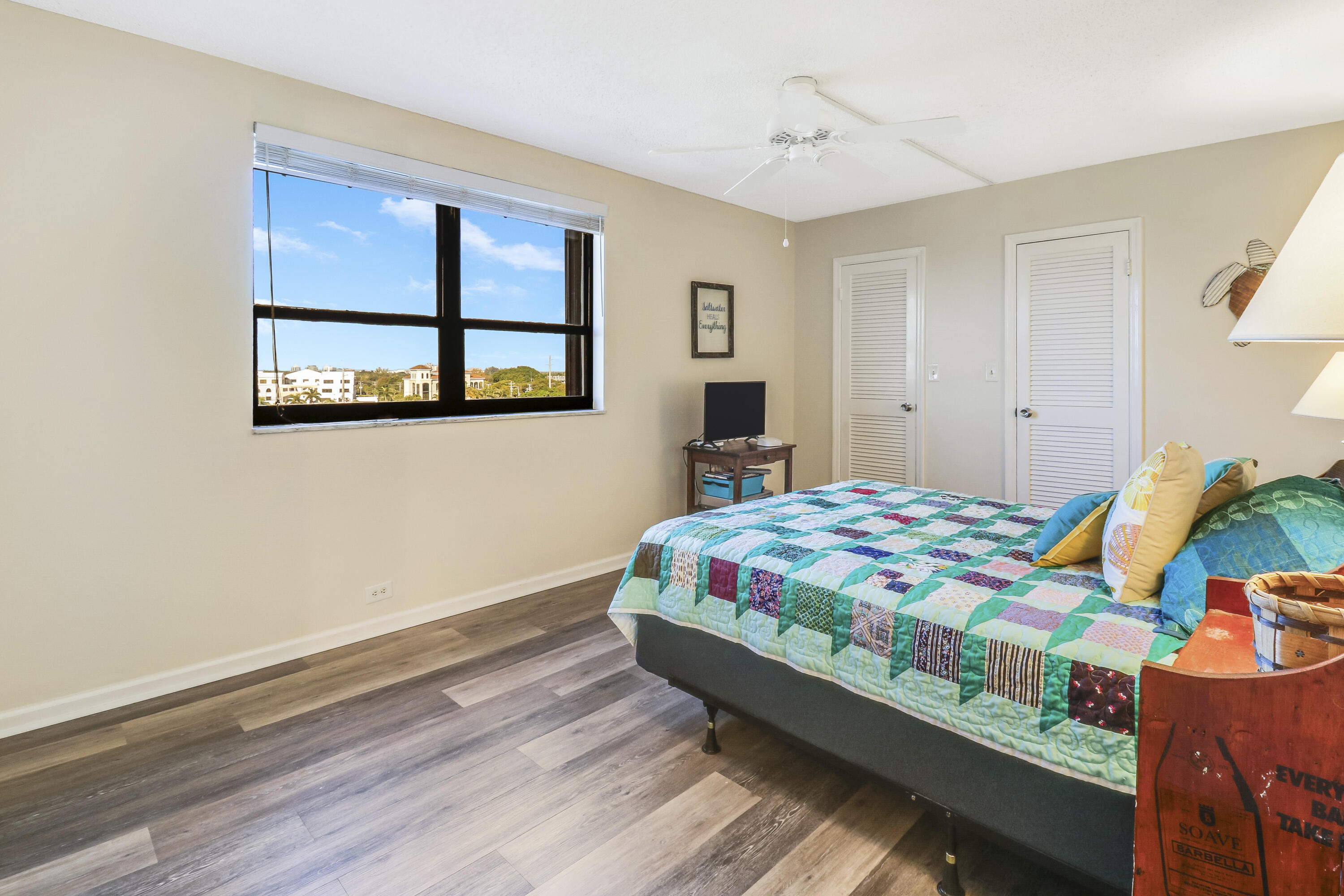 1200 Marine Way, Unit 607 North Palm Beach, FL 33408 - Photo 26 of 53 a bedroom with a bed and a window