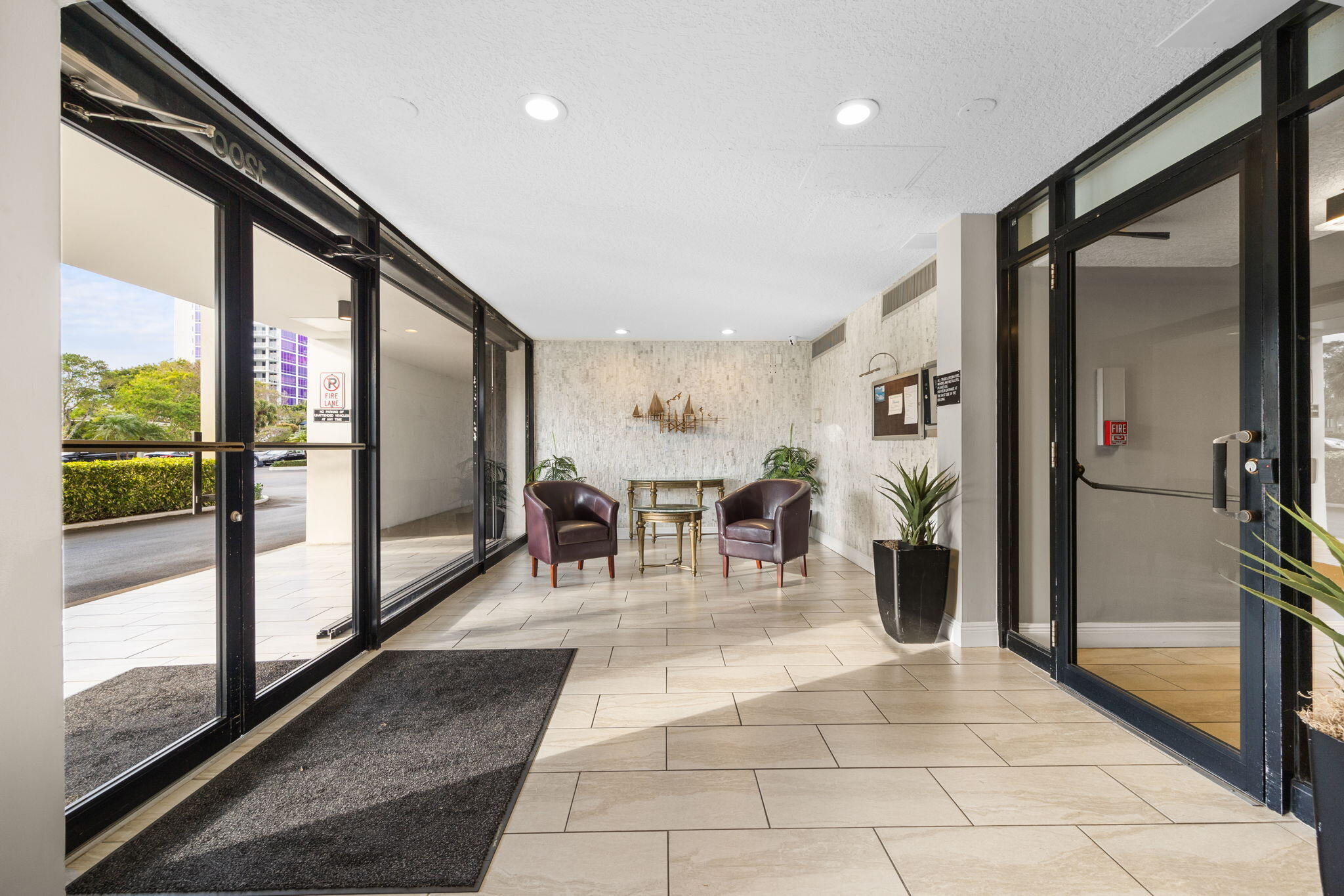 1200 Marine Way, Unit 607 North Palm Beach, FL 33408 - Photo 4 of 53 a lobby with furniture and view of living room