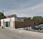 a view of a backyard with sitting area and furniture