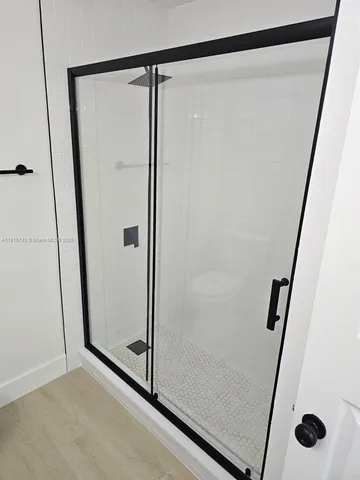 a view of a wooden fence