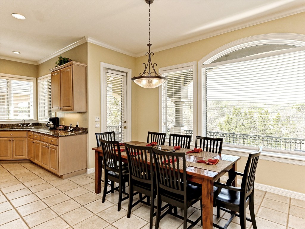 8212 Barton Club Drive, Unit 910 Austin, TX 78735 - Photo 12 of 26 a view of a dining room with furniture window and outside view