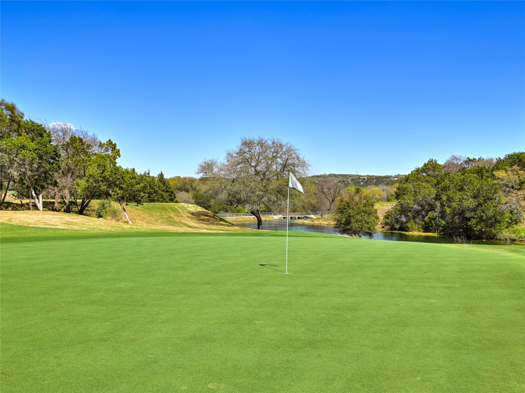 8212 Barton Club Drive, Unit 910 Austin, TX 78735 - Photo 25 of 26 a view of an outdoor space and a yard