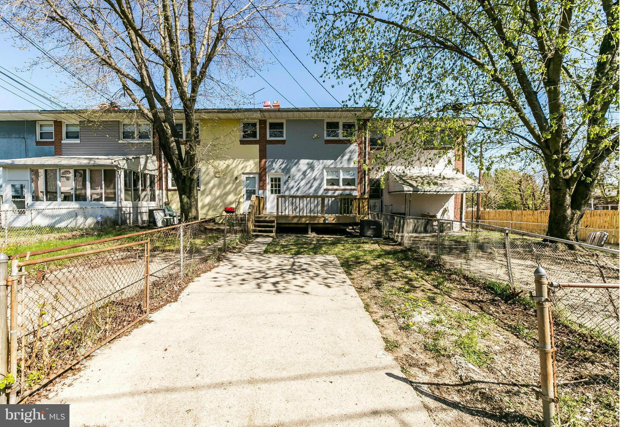 4802 Strathdale Road Baltimore, MD 21206 - Photo 20 of 23 a front view of a house with garden