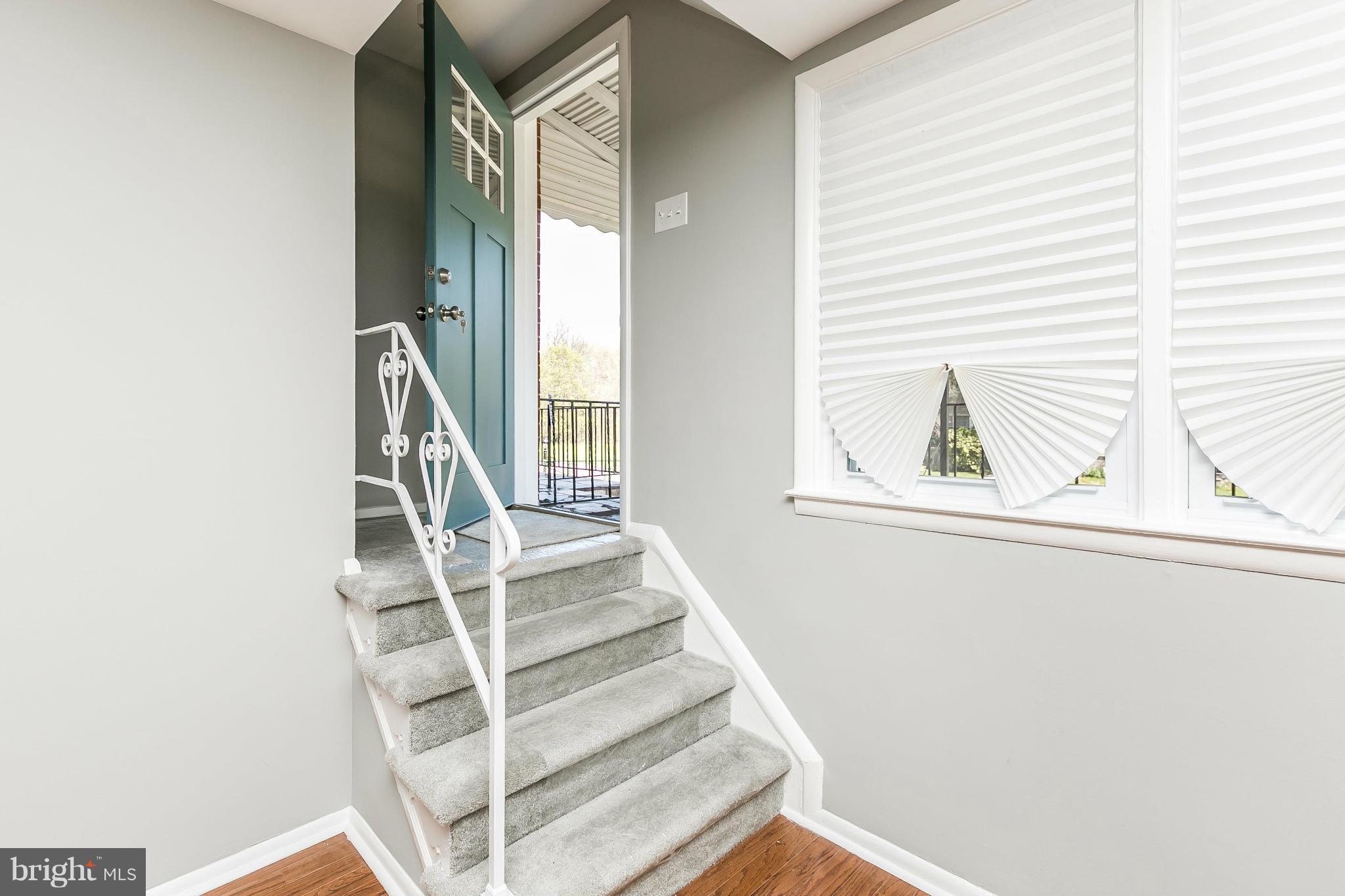 4802 Strathdale Road Baltimore, MD 21206 - Photo 4 of 23 a view of entryway and hall with wooden floor