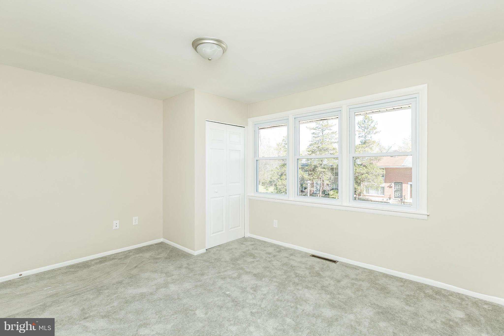 4802 Strathdale Road Baltimore, MD 21206 - Photo 10 of 23 a view of an empty room with a window