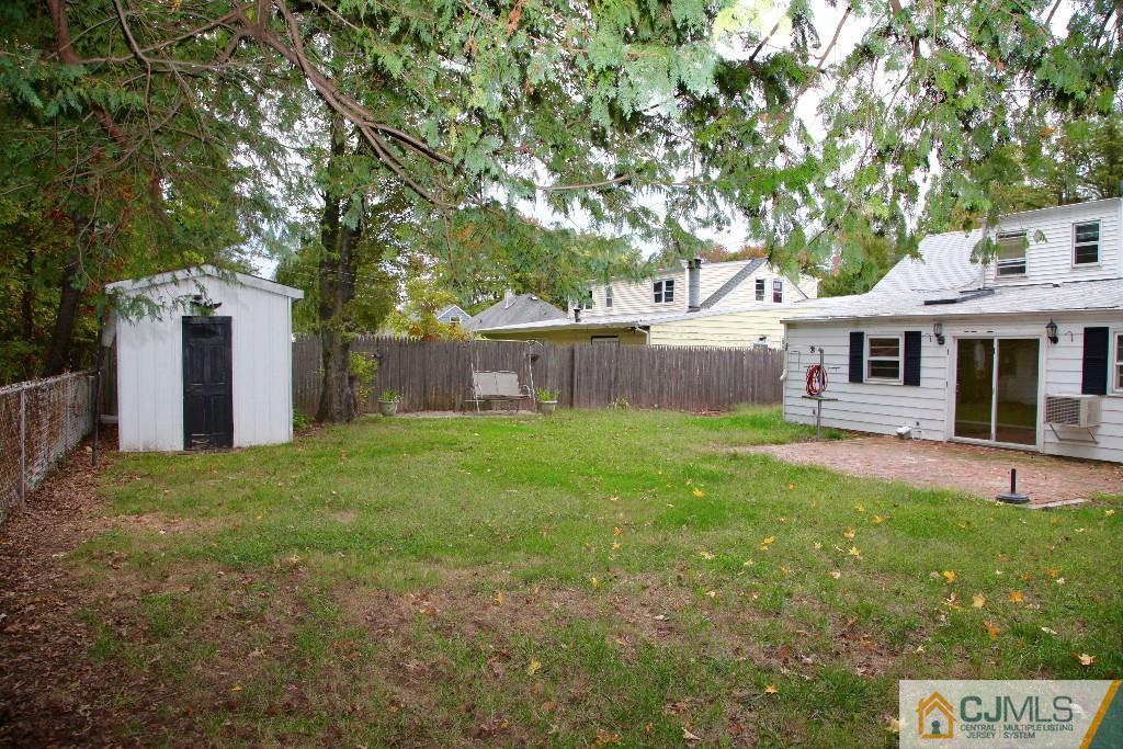 47 Caldwell Road Edison, NJ 08817 - Photo 11 of 14 front view of a house with a yard