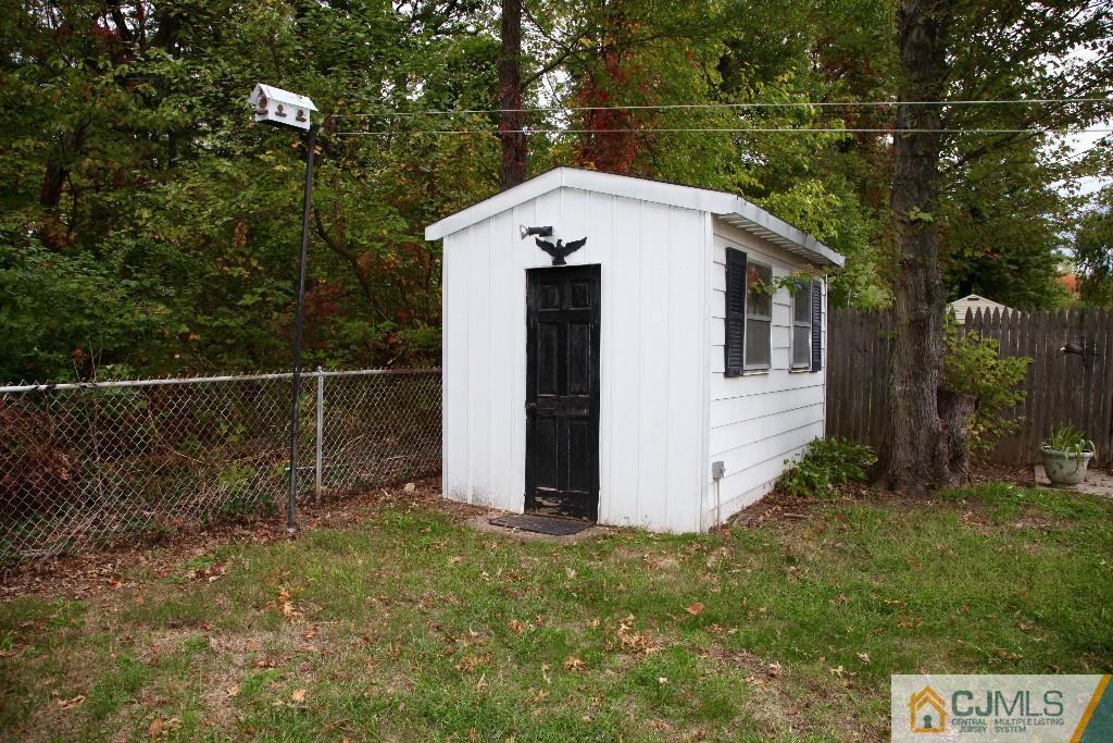 47 Caldwell Road Edison, NJ 08817 - Photo 13 of 14 a view of a small house