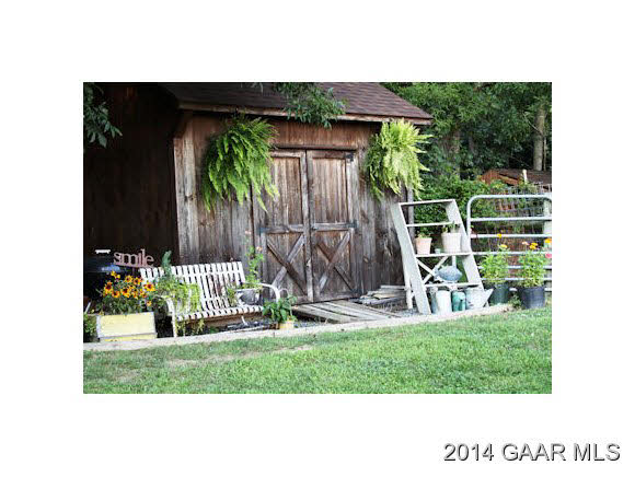 334 Rife's Ford Road Verona, VA 24482 - Photo 11 of 21 a view of a backyard with a garden and plants