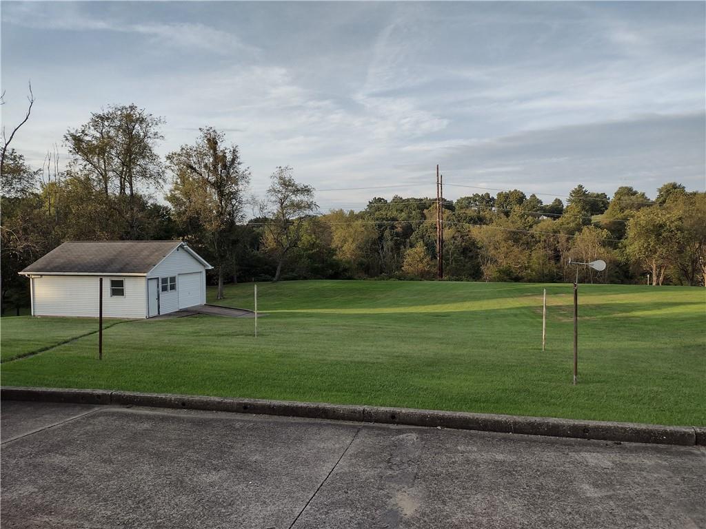 201 Glauser Lane Lower Burrell, PA 15068 - Photo 3 of 13 a view of a house with a backyard