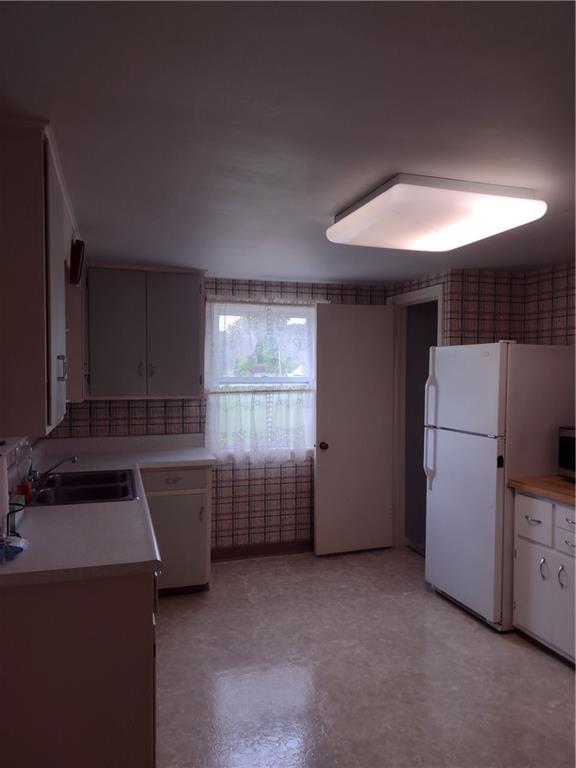 201 Glauser Lane Lower Burrell, PA 15068 - Photo 5 of 13 a kitchen with storage and utility