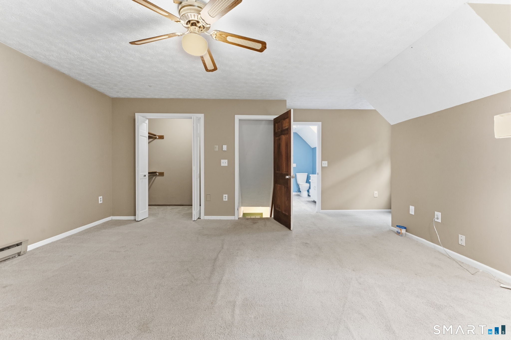 18 Shoddy Mill Road Bolton, CT 06043 - Photo 20 of 27 This is a large room over the garage with direct access to the 3rd bathroom and it's own staircase to the first floor. Would make a nice in law area or home office