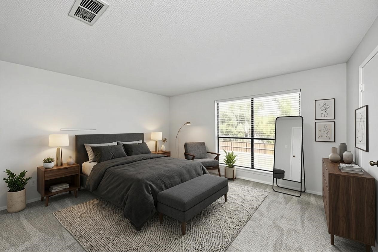 3750 Tanglewilde Street, Unit A7 Houston, TX 77063 - Photo 26 of 41 a bedroom with furniture and a window