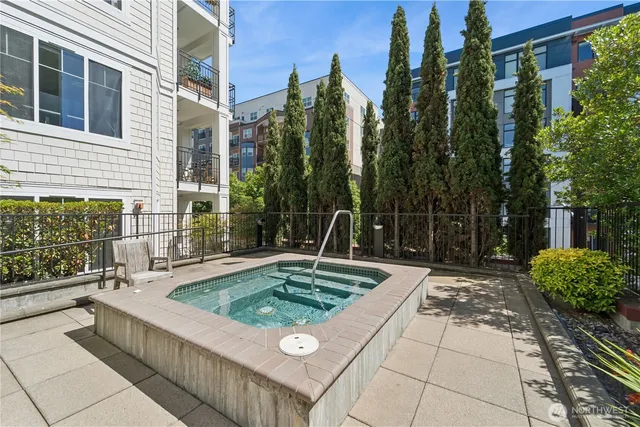 a view of a swimming pool with a patio