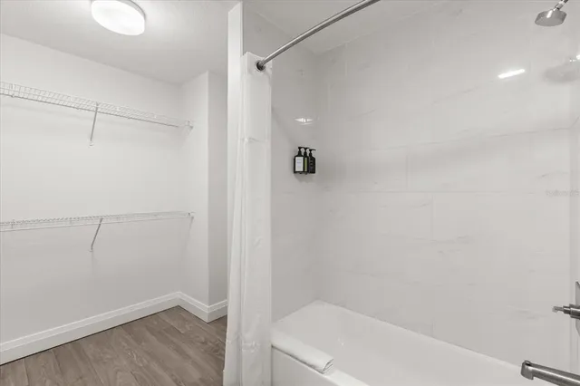 a bathroom with a sink a toilet and a bathtub