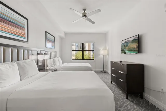 a bed room with bed and a window