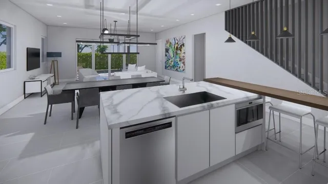 a kitchen with a sink and chandelier