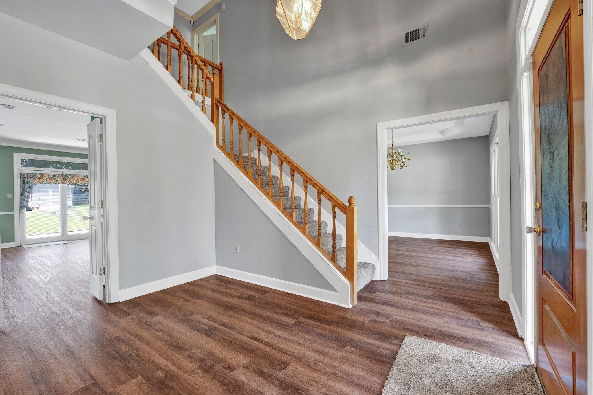 4149 Old Forest Road Memphis, TN 38125 - Photo 8 of 32 Foyer entrance with dark hardwood / wood-style flooring
