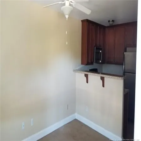 a bathroom with a shower and a sink