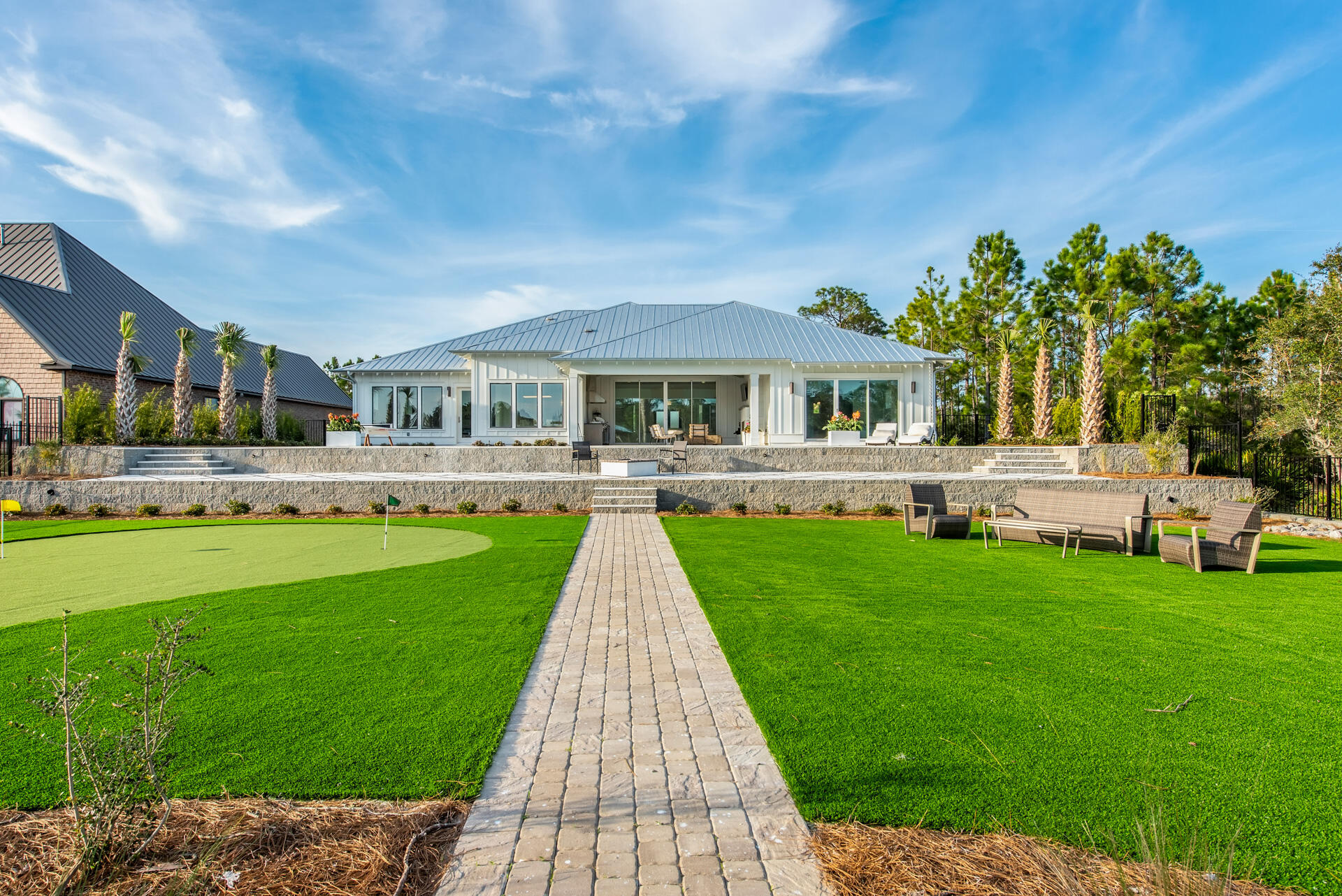 336 East Shipwreck Road Santa Rosa Beach, FL 32459 - Photo 27 of 73 a front view of a house with a yard table and chairs