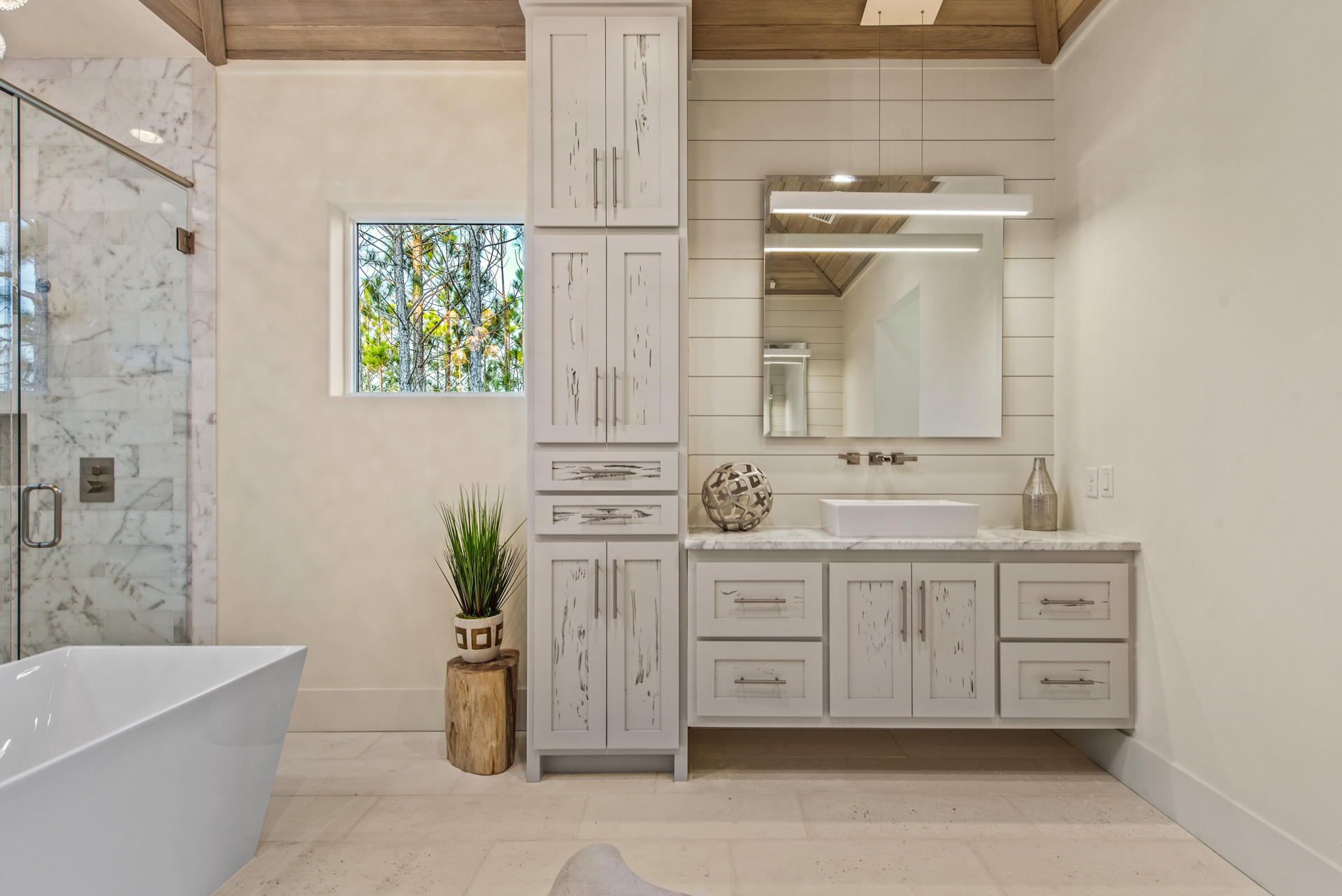 336 East Shipwreck Road Santa Rosa Beach, FL 32459 - Photo 48 of 73 a bathroom with a double vanity sink and a bathtub