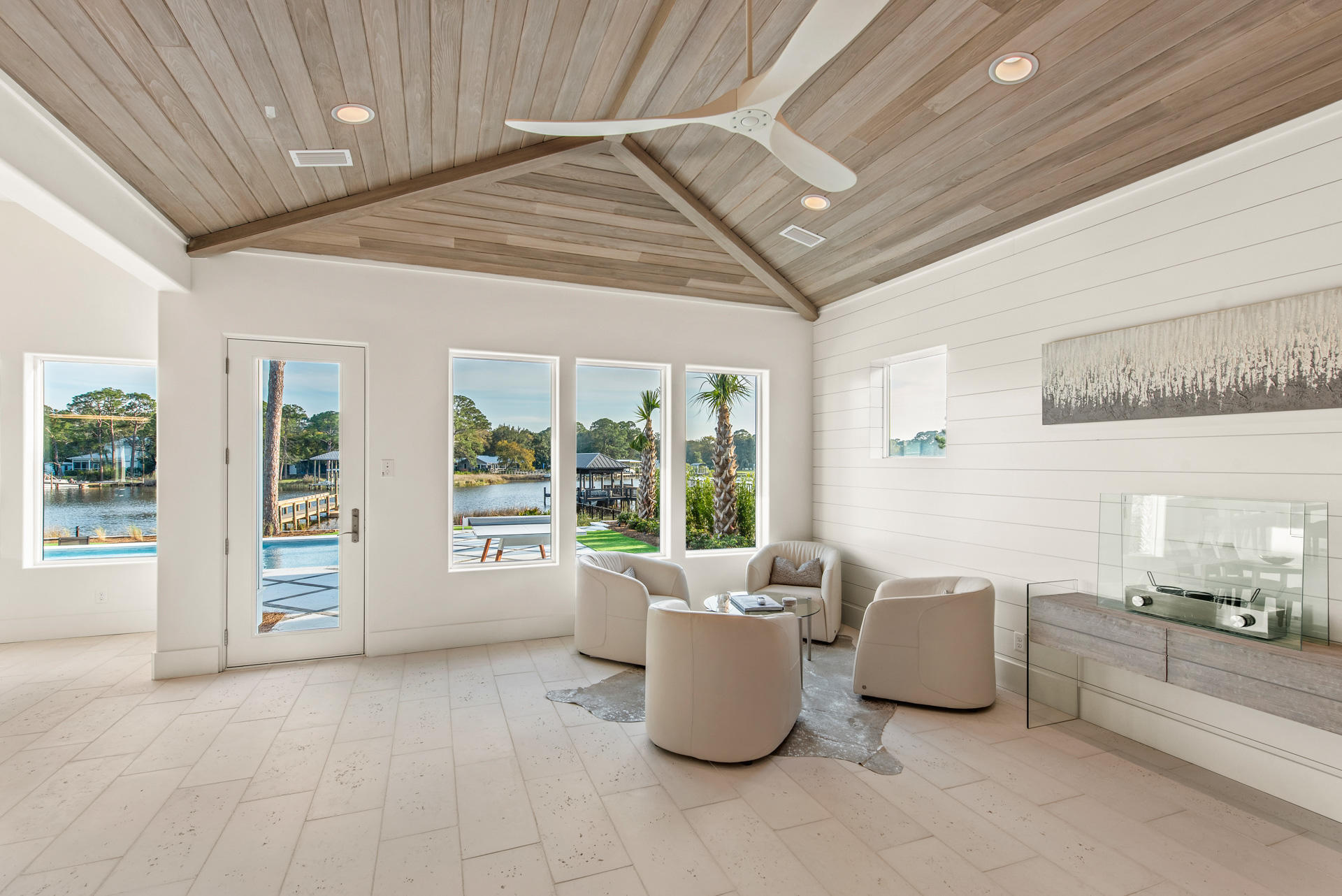 336 East Shipwreck Road Santa Rosa Beach, FL 32459 - Photo 53 of 73 a living room with furniture and large windows