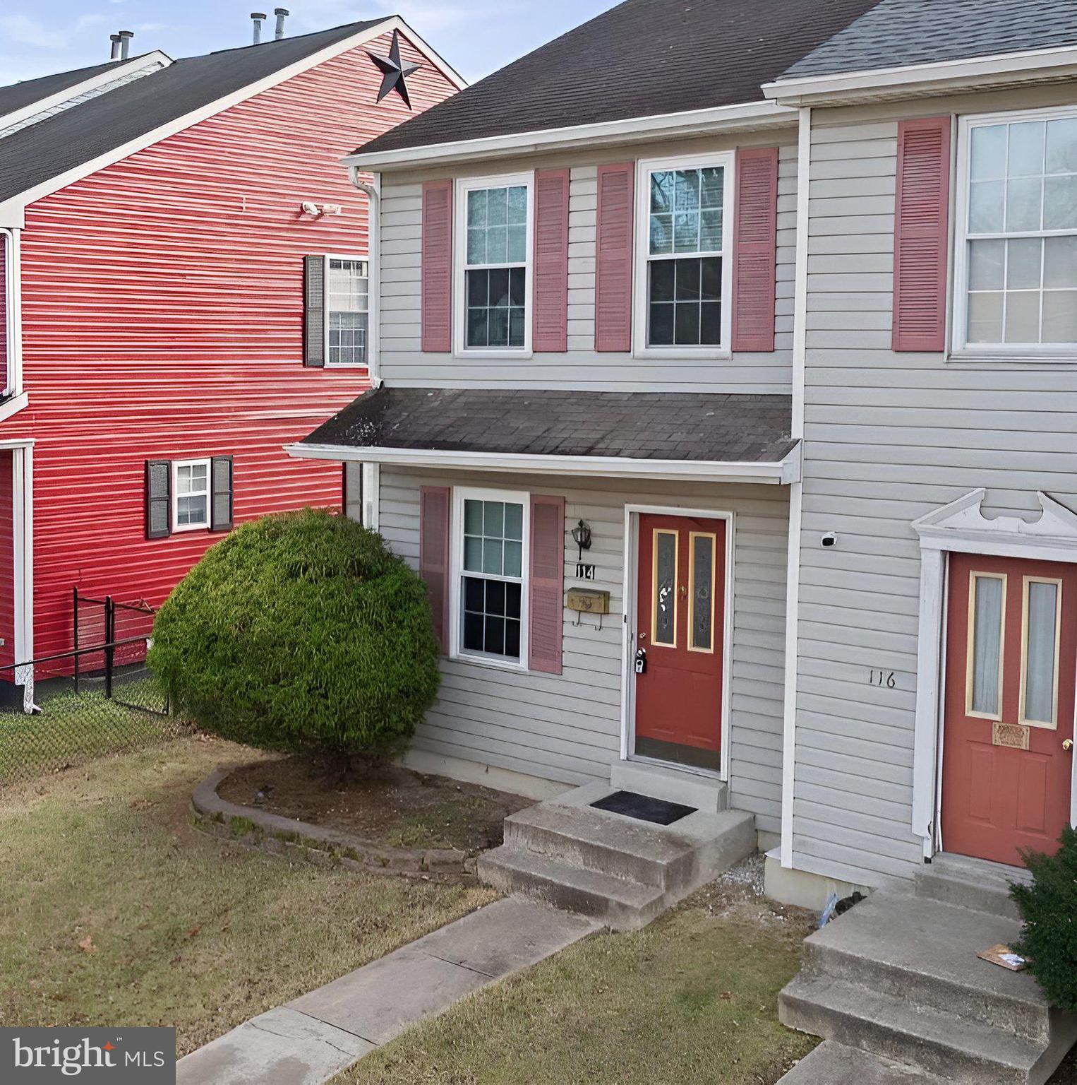 114 Gloucester Avenue Lawnside, NJ 08045 - Photo 1 of 22 a view of a brick building with many windows