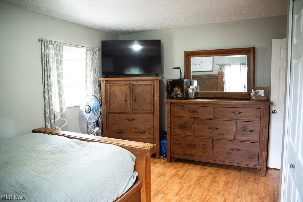 1906 Aberdeen Road Madison, OH 44057 - Photo 11 of 16 Bedroom featuring new flooring