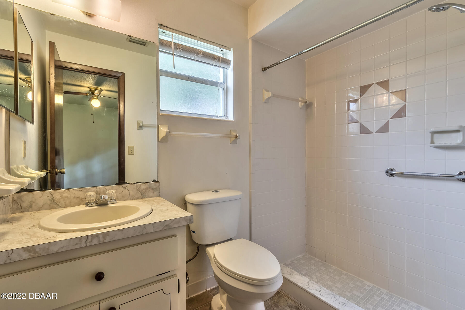 8 Greenfern Circle Ormond Beach, FL 32174 - Photo 12 of 25 a bathroom with a granite countertop sink toilet and shower
