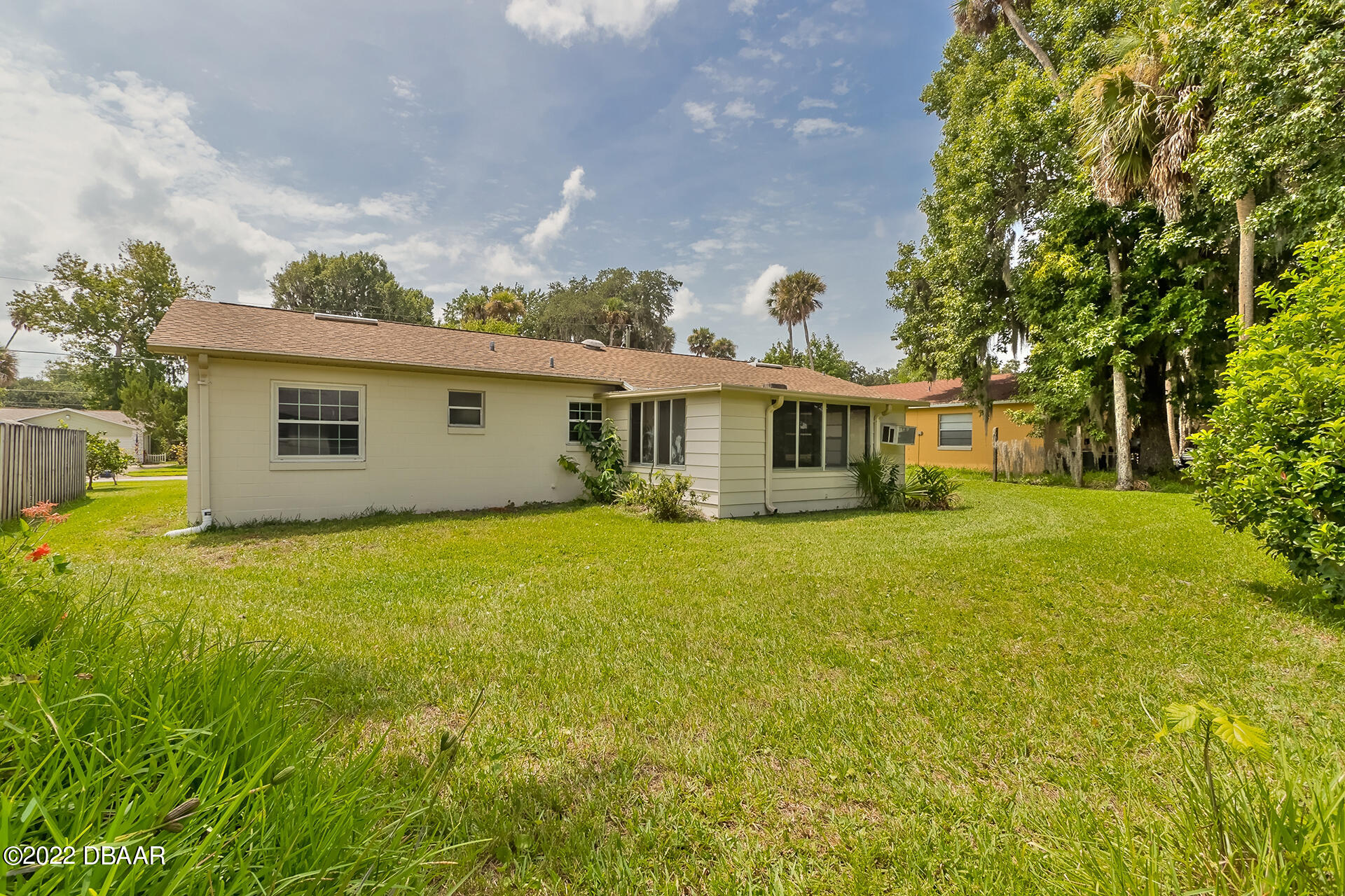 8 Greenfern Circle Ormond Beach, FL 32174 - Photo 23 of 25 a front view of a house with yard and green space