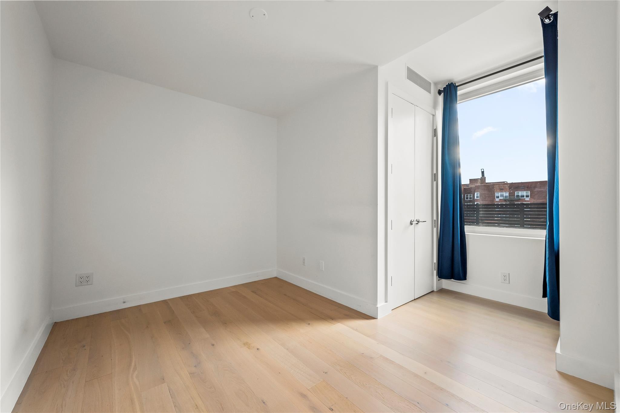 13618 Maple Avenue, Unit 5F Queens, NY 11355 - Photo 2 of 41 Bonus room featuring light wood finished floors and baseboards