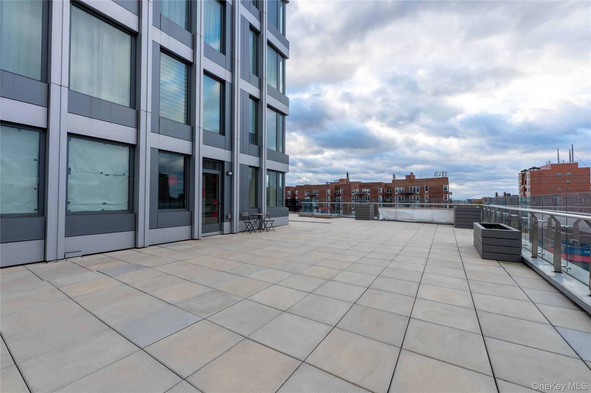 13618 Maple Avenue, Unit 5F Queens, NY 11355 - Photo 22 of 41 View of patio with a view of city