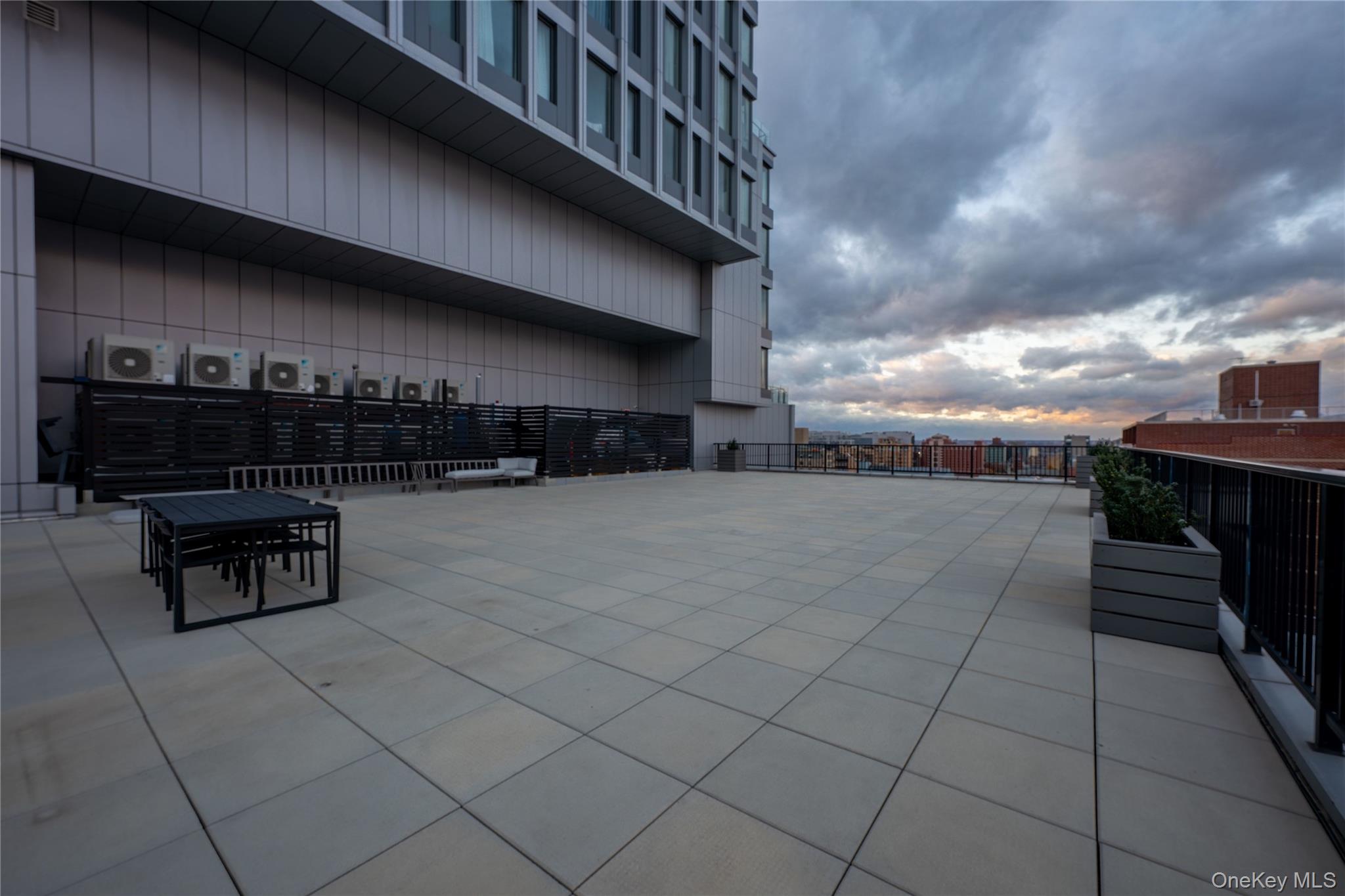 13618 Maple Avenue, Unit 5F Queens, NY 11355 - Photo 23 of 41 View of home's community featuring a patio