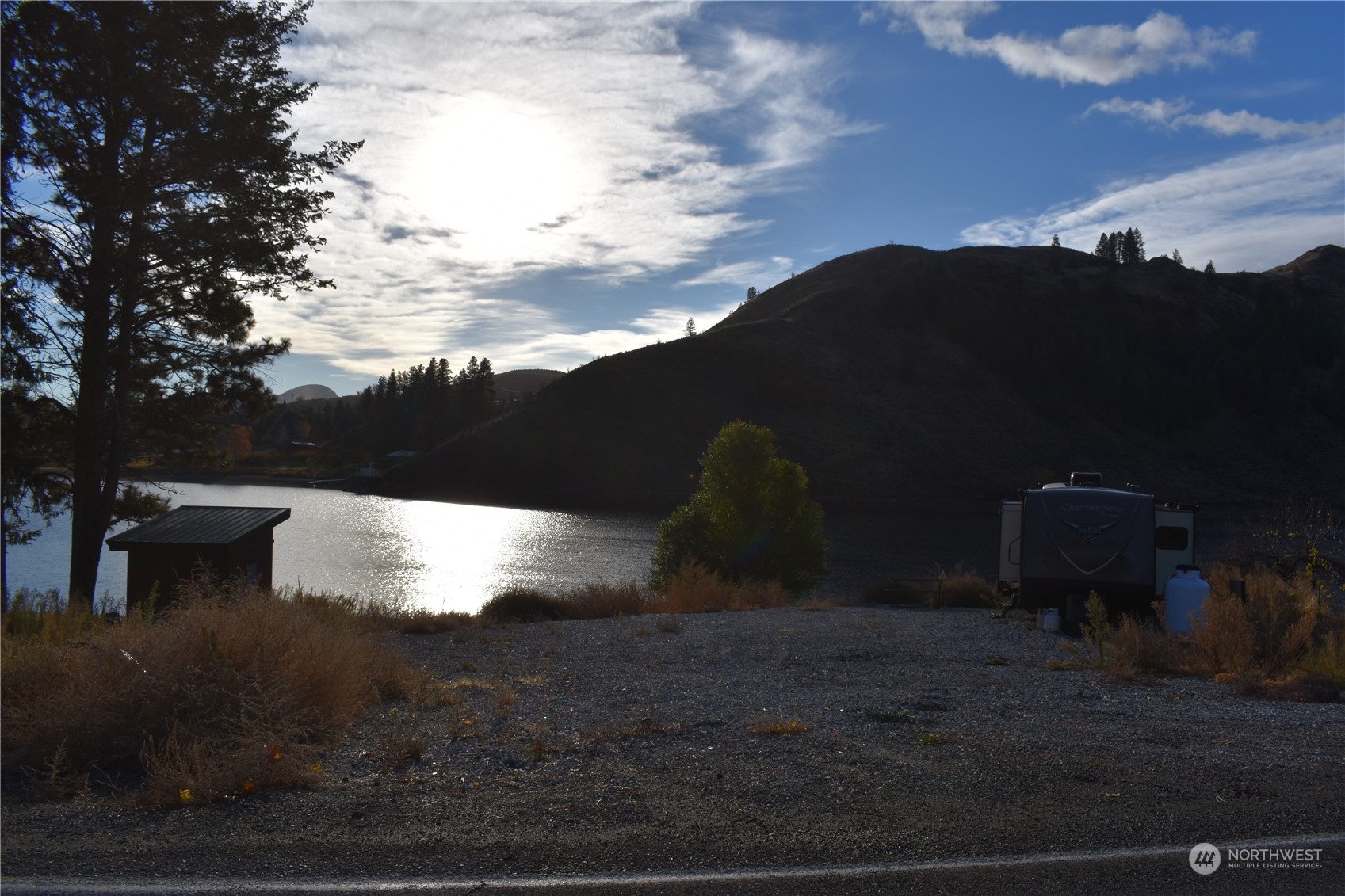685 Loomis-Oroville Road Tonasket, WA 98855 - Photo 12 of 36 a view of a backyard of the house