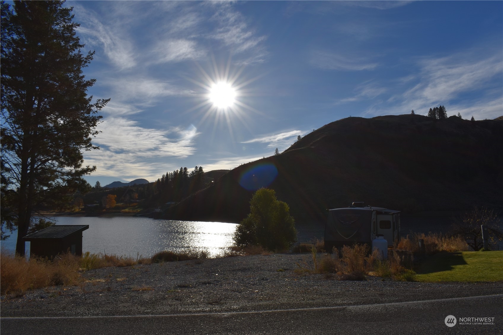 685 Loomis-Oroville Road Tonasket, WA 98855 - Photo 17 of 36 a view of a yard in front of the house