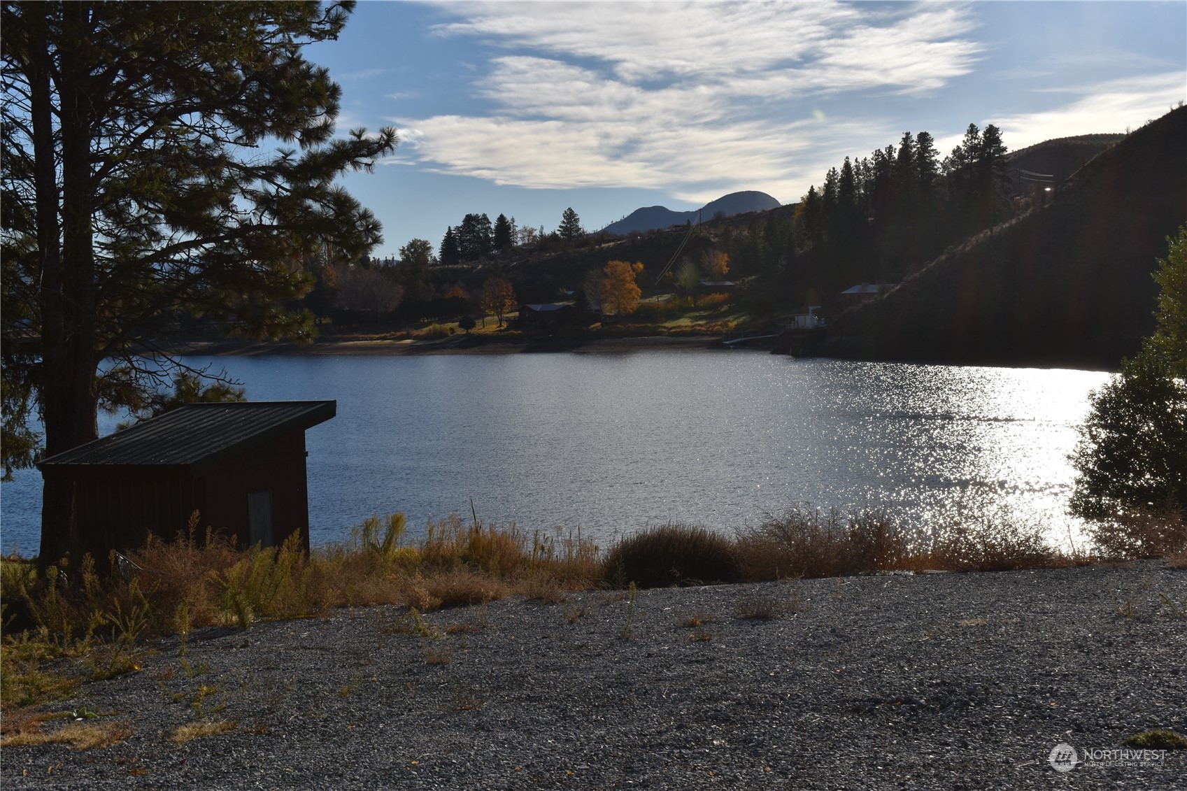 685 Loomis-Oroville Road Tonasket, WA 98855 - Photo 18 of 36 a view of a lake in middle of forest