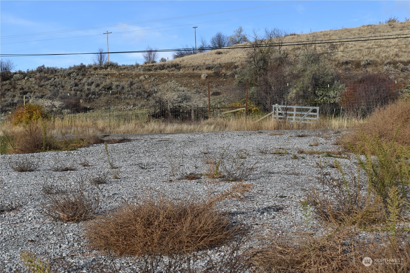 685 Loomis-Oroville Road Tonasket, WA 98855 - Photo 25 of 36 a view of a lake with a mountain in the background