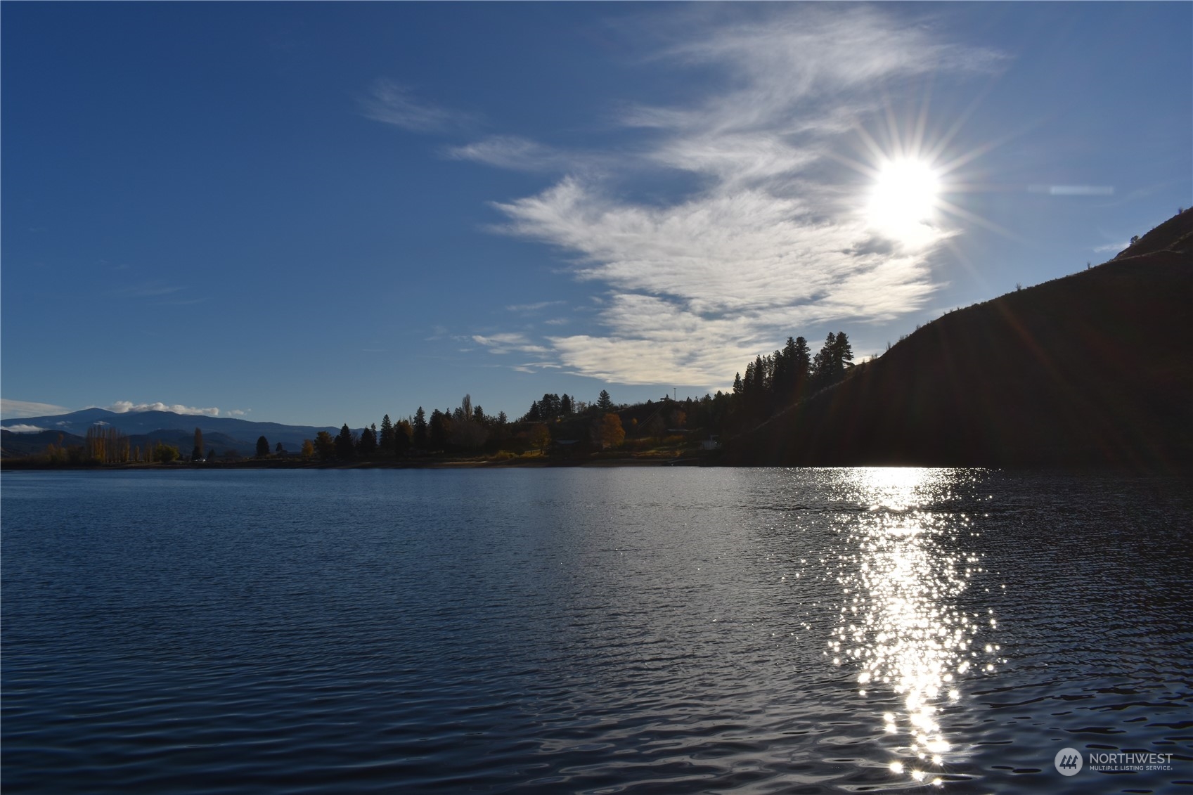 685 Loomis-Oroville Road Tonasket, WA 98855 - Photo 3 of 36 a view of lake and mountain