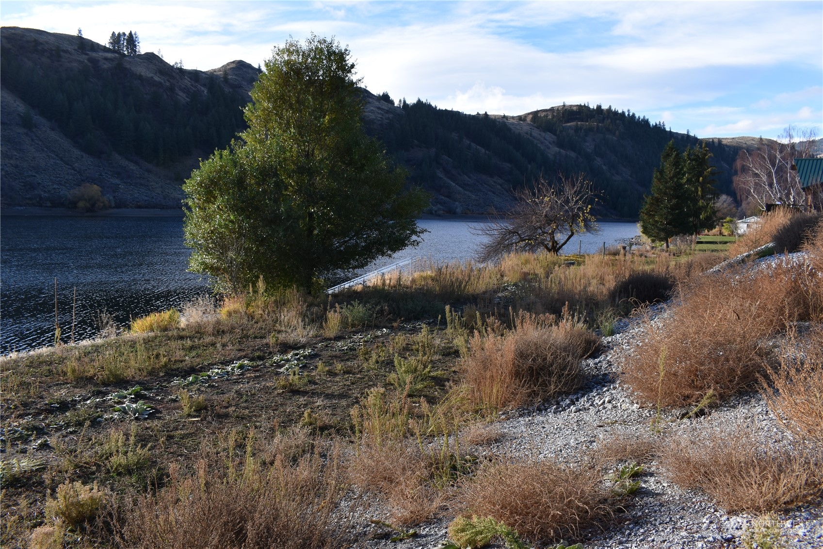 685 Loomis-Oroville Road Tonasket, WA 98855 - Photo 10 of 36 a view of a town with trees
