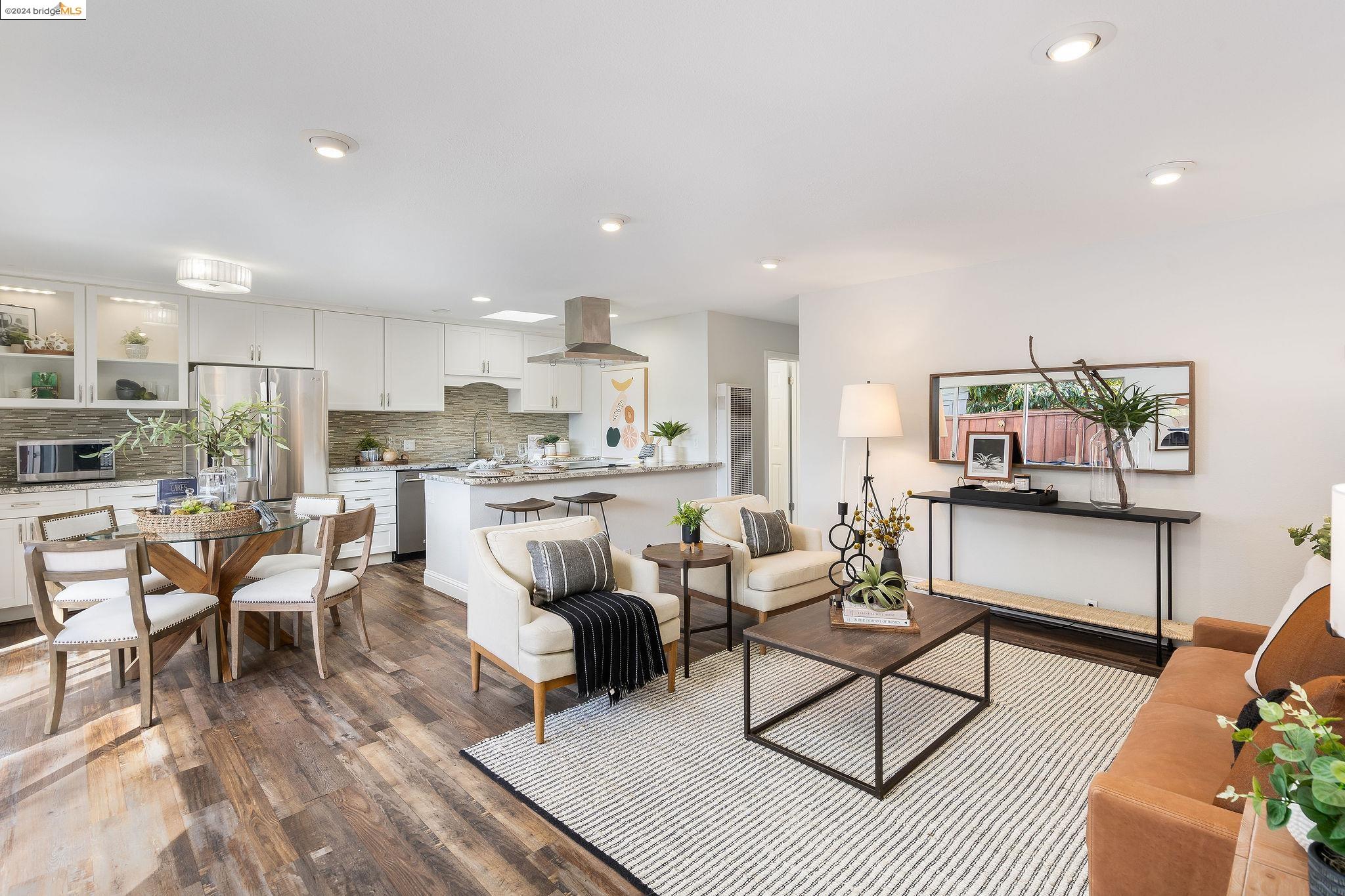 2600 Jones Road, Unit 2 Walnut Creek, CA 94597 - Photo 1 of 1 a living room with lots of furniture and kitchen view