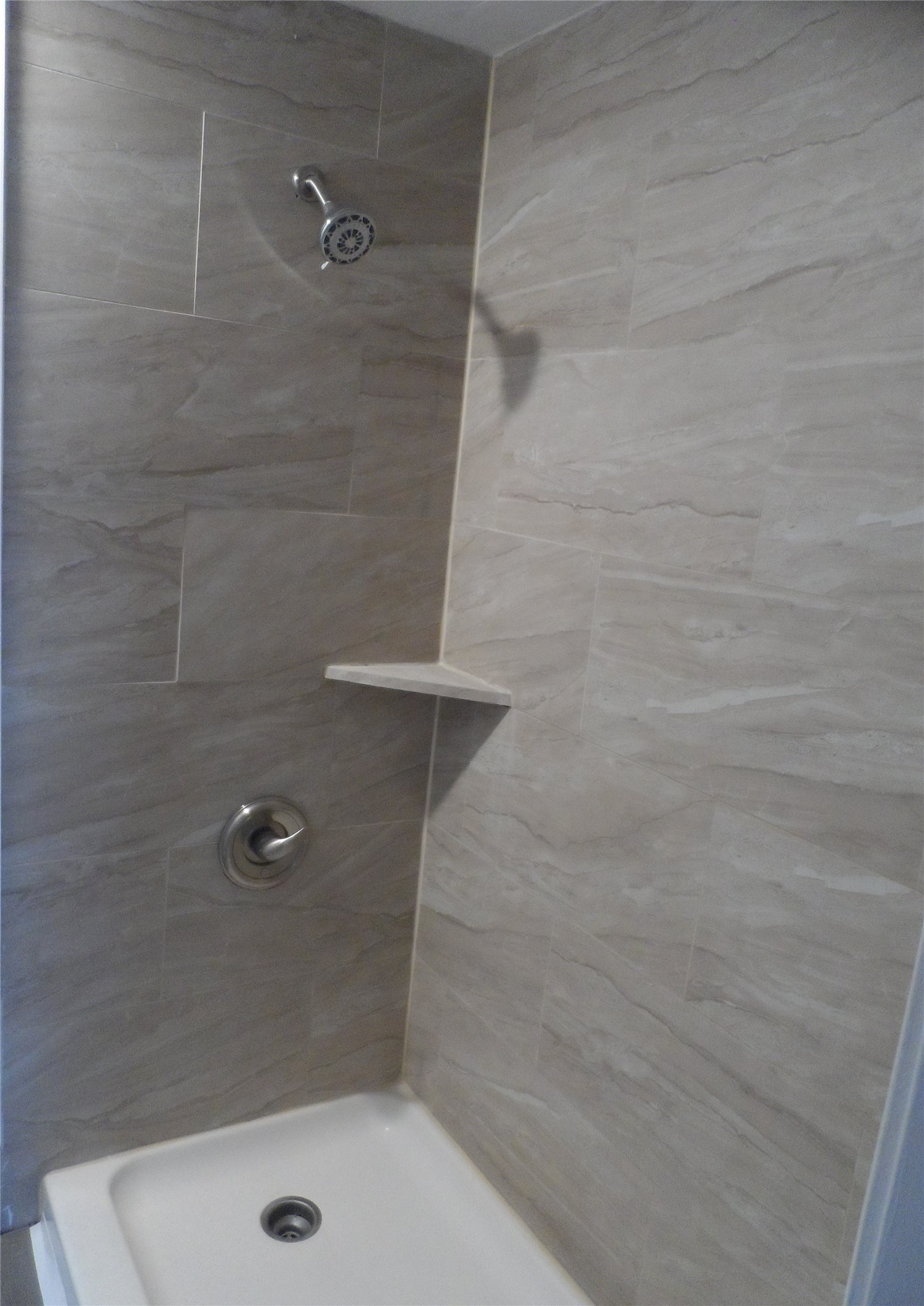12900 Walden Road, Unit 618F Montgomery, TX 77356 - Photo 9 of 19 a bathroom with a shower