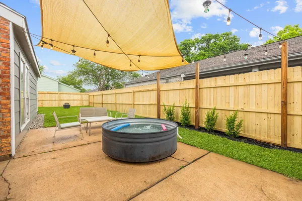 a view of yard with outdoor seating