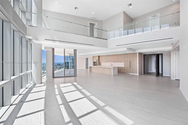 a view of lobby with furniture and outdoor view
