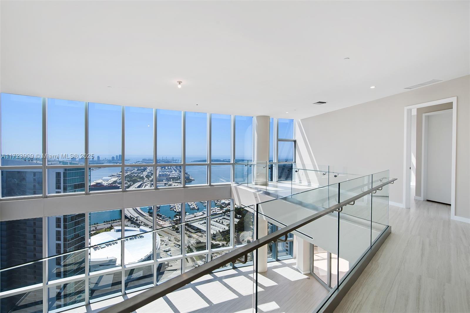 851 Northeast 1st Avenue, Unit PH5411 Miami, FL 33132 - Photo 21 of 40 a view of a balcony kitchen and furniture
