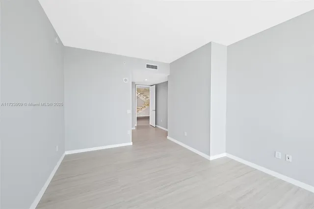 an empty room with window