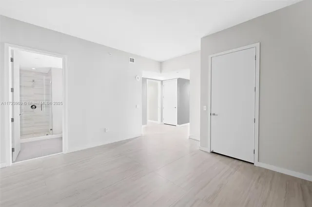 a view of a livingroom with wooden floor