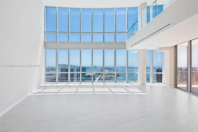 a view of a furniture and window in a room