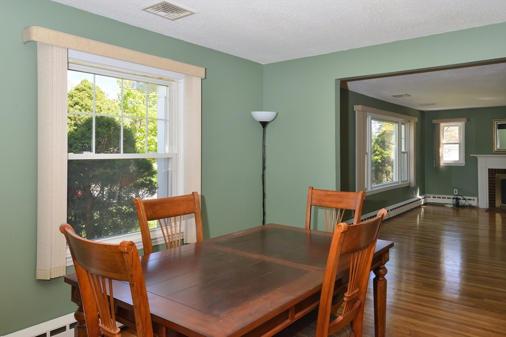 99 Talbot Road Springfield, MA 01119 - Photo 8 of 21 a view of a dining room with furniture and wooden floor